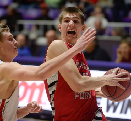 Francisco Kjolseth  |  The Salt Lake Tribune 
Spanish Fork's Hunter Schofield (44) battles his way to a basket in 4A boys' hoops quarterfinal at the Dee Events Center in Ogden on Thursday, Feb. 26, 2015.