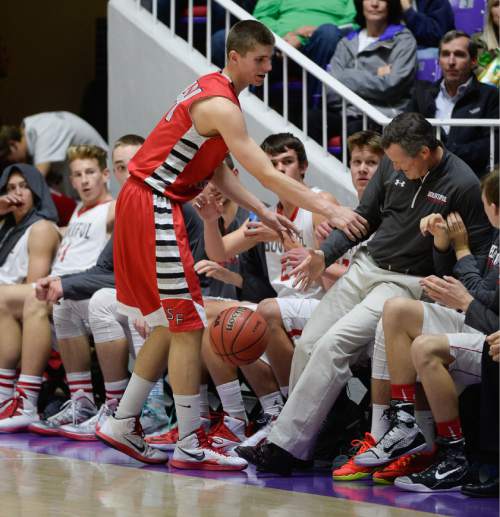Francisco Kjolseth  |  The Salt Lake Tribune 
The Bountiful coach ends up on top of the bench during the 4A boys' hoops quarterfinal against Spanish Fork at the Dee Events Center in Ogden on Thursday, Feb. 26, 2015.