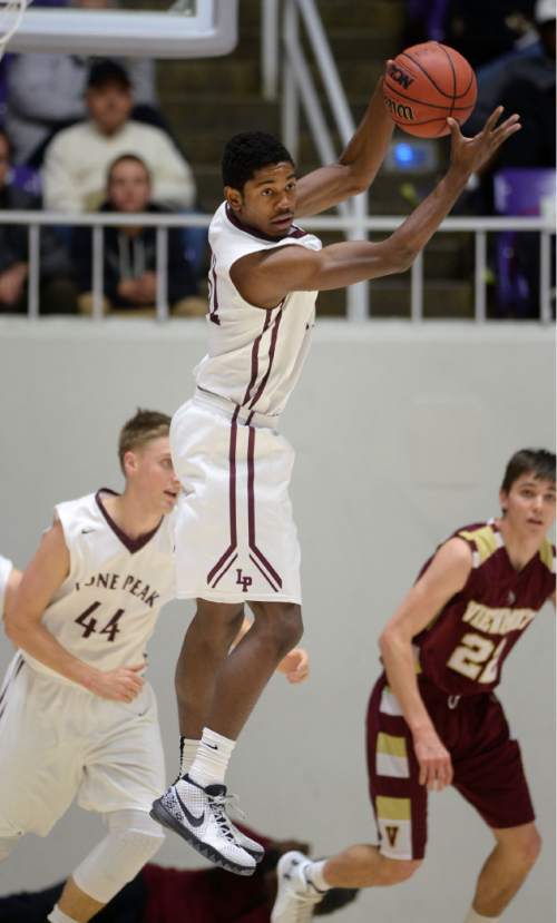 Steve Griffin  |  The Salt Lake Tribune

Lone Peak's Christian Popoola (51) grabs a rebound during quarterfinals of the boy's 5A basketball state tournament game against  Viewmont at the Dee Event Center in Ogden, Wednesday, February 25, 2015.