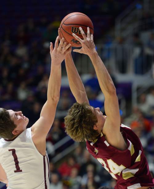 Steve Griffin  |  The Salt Lake Tribune

Viewmont's Austin Johnson (24) grabs a rebound over Lone Peak's Tyson Doman (1) during quarterfinals of the boy's 5A basketball state tournament game at the Dee Event Center in Ogden, Wednesday, February 25, 2015.