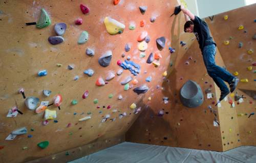 Rick Egan  |  The Salt Lake Tribune

Matt Klassen practices on the climbing wall at the new George S. Eccles Student Life Center at the University of Utah, Thursday, February 26, 2015