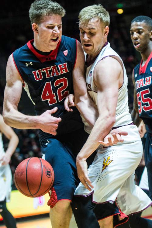 Chris Detrick  |  The Salt Lake Tribune
Utah Utes forward Jakob Poeltl (42) and Arizona State Sun Devils forward Jonathan Gilling (31) go for the ball during the game at the Huntsman Center Thursday February 26, 2015.  Utah is winning 41-9 at halftime.