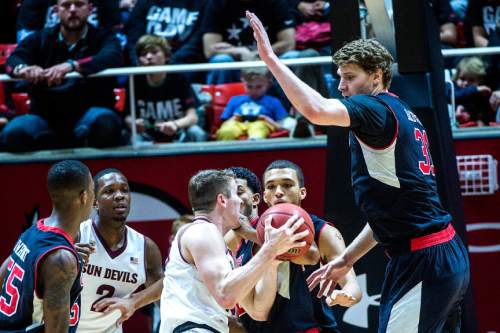 Chris Detrick  |  The Salt Lake Tribune
Utah Utes center Dallin Bachynski (31) blocks Arizona State Sun Devils guard Bo Barnes (33) during the game at the Huntsman Center Thursday February 26, 2015.  Utah is winning 41-9 at halftime.