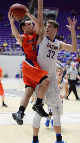 Francisco Kjolseth  |  The Salt Lake Tribune 
Timpview's Britain Covey (2) tries to push past Orem's Joshua Carlile (32) in 4A boys' hoops quarterfinal at the Dee Events Center in Ogden on Thursday, Feb. 26, 2015.