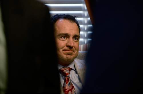 Scott Sommerdorf   |  The Salt Lake Tribune
Speaker of the House, Greg Hughes, R-Draper, is seen between a crush of reporters after his media availability in his office, Thursday, February 26, 2015. Hughes responded to reporter's questions about the House's handling of the Governor's Healthy Utah plan.
