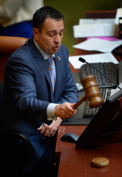 Scott Sommerdorf   |  The Salt Lake Tribune
House Speaker Greg Hughes, R-Draper, shown here gaveling the House to order Jan. 28, 2015, says he believes the sides will reach a deal on an alternative to Medicaid expansion.