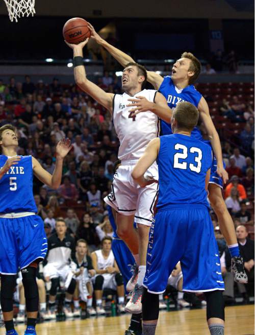 Leah Hogsten  |  The Salt Lake Tribune
Dixie's Richard Guymon blocks the shot of Pine View's Kody Wilstead. Pine View High School boys basketball team defeated Dixie High School 46-43 to win the 3A State Championship game, Saturday, February 28, 2015 at the Maverick Center.