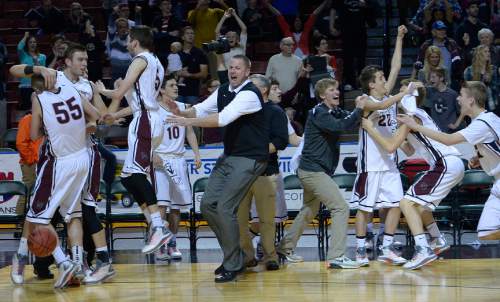 Leah Hogsten  |  The Salt Lake Tribune
Pine View celebrates the win. Pine View High School boys basketball team defeated Dixie High School 46-43 to win the 3A State Championship game, Saturday, February 28, 2015 at the Maverick Center.