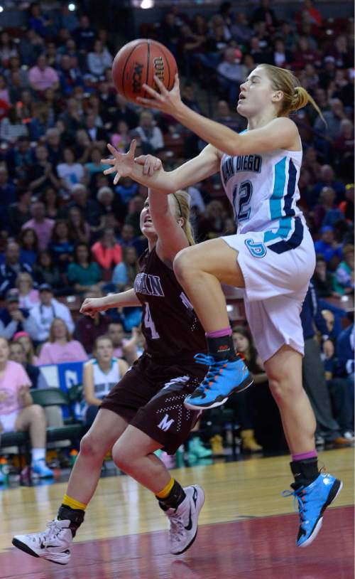 Leah Hogsten  |  The Salt Lake Tribune
Juan Diego's Becca Curran is fouled by Morgan's Ali Tonks. Juan Diego High School girls basketball team defeated Morgan High School 67-47 to win the 3A State Championship game, Saturday, February 28, 2015 at the Maverick Center.