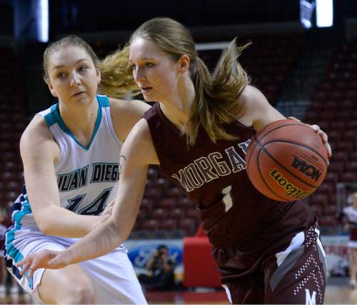 Leah Hogsten  |  The Salt Lake Tribune
Juan Diego's Ann Nelson sticks with Morgan's Lizzy Peterson. Juan Diego High School girls basketball team leads Morgan High School 26-17 at the half during their 3A State Championship game, Saturday, February 28, 2015 at the Maverick Center.