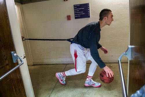 Chris Detrick  |  The Salt Lake Tribune
Bountiful's Jeffrey Pollard (13) warms up before the 4A semifinal game at the Dee Events Center Friday February 27, 2015.