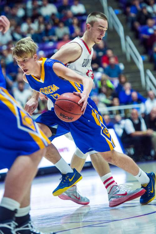 Chris Detrick  |  The Salt Lake Tribune
Orem's Wilhelm Clark runs past Bountiful's Jeffrey Pollard (13) during the 4A semifinal game at the Dee Events Center Friday February 27, 2015.  Bountiful is defeating Orem 43-13 at halftime.