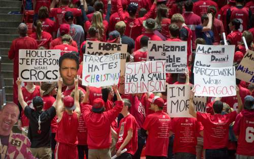 Rick Egan  |  The Salt Lake Tribune

Utah fans turn their back on the Wildcats asa they are introduced before the game, in Pac-12 basketball action in the  Huntsman Center, Saturday, February 28, 2015.