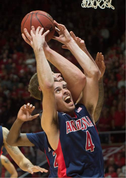 Rick Egan  |  The Salt Lake Tribune

Arizona Wildcats guard T.J. McConnell (4) brings down a rebound for the Wildcats,  in Pac-12 basketball action in the Huntsman Center, Saturday, February 28, 2015.
