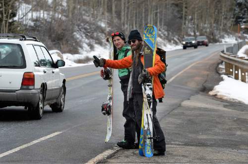 Scott Sommerdorf   |  The Salt Lake Tribune
Friends Sean Brass and Shane Metos were looking for a ride to Brighton as they left the Silver Fork area of Little Cottonwood Canyon to ski/snowboard in the new snow, Sunday, March 1, 2015.
