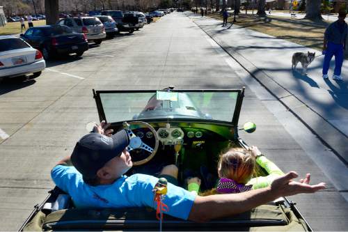 Scott Sommerdorf   |  The Salt Lake Tribune
Jim Johnson and his daughter Autumn Sky "Bogi" Johnson decided to take a drive through Liberty Park in his rebuilt 1929 Ford Roadster because of the nice weather, Sunday, February 8, 2015.