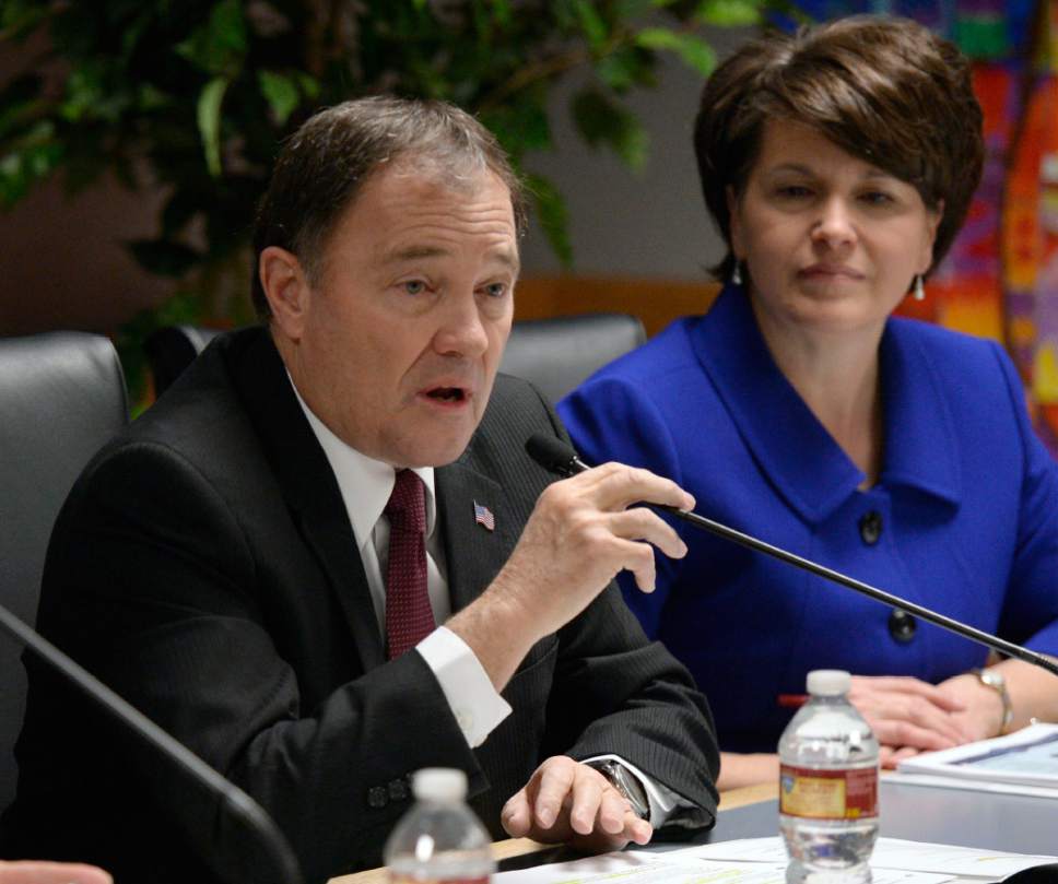 Al Hartmann  |  The Salt Lake Tribune
Gov. Gary Herbert speaks at a Utah State School Board meeting in February with his education advisor, Tami Pyfer. At the Legislature, Pyfer has been testifying against bills that may favor certain vendors of technology for schools.