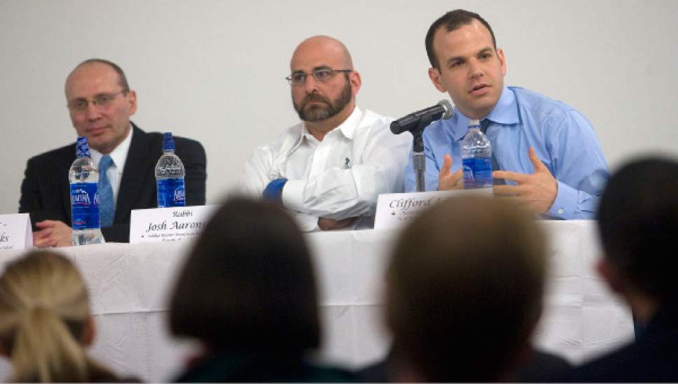 ACLU and Utah Pride Center panel discusses co-existence between gay and transgender people and the religious people who don't approve of them in a panel discussion at the Student Event Center at the Salt Lake Community College, Redwood Campus on Friday.  Three of the 5 members of the panel from left are:  Professor Fred Gedicks, College of Law BYU Law School,  Rabbi Josh Aaronson,  Saidye Rosner ronfman Rabbinic Chair-Temple Har Shalome, and Clifford J. Rosky, Associate Professor of Law-University of Utah S.J Quinney College of Law.     Al Hartmann/The Salt Lake Tribune     4/1/0/09
