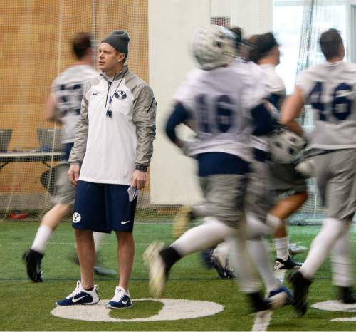 Francisco Kjolseth  |  The Salt Lake Tribune 
BYU football coach Bronco Mendenhall draws his team back the locker room following spring camp on Monday, March 2, 2015, at the Smith Fieldhouse.