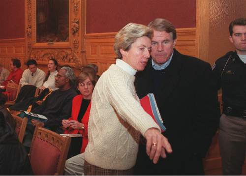 Tribune file photo

Salt Lake City Mayor Deedee Corradini and her husband John Huebner speak before a City Council meeting in 1999.