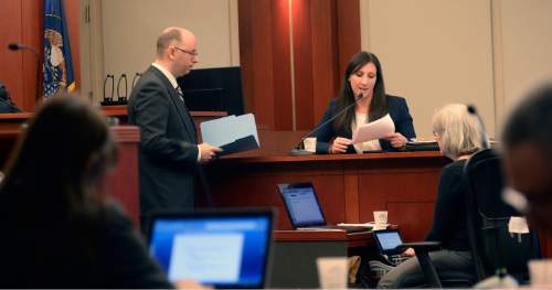 Al Hartmann  |  The Salt Lake Tribune 
Prosecutor Matthew Janzen, left, questions Emily Jeskie of Sorenson Forensics on DNA evidence in 3rd District Court in Salt Lake City Wednesday March 4, 2015, in Johnny Brickman Wall's murder trial. Wall, a former Utah pediatrician, is accused of killing his ex-wife, Uta von Schwedler, at her Sugar House home in 2011.