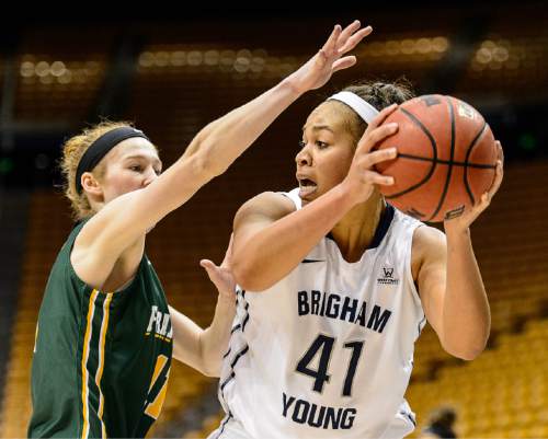 Trent Nelson  |  The Salt Lake Tribune
Brigham Young Cougars forward Morgan Bailey (41) defended by San Francisco Lady Dons guard Rachel Howard (11) as BYU hosts San Francisco, NCAA women's basketball at the Marriott Center in Provo, Saturday January 3, 2015.
