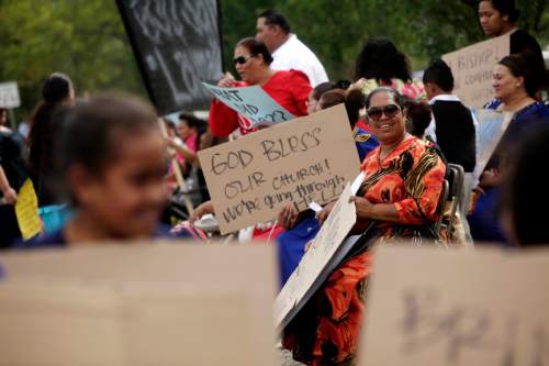 Ashley Detrick  |  The Salt Lake Tribune
Ate Nai and dozens of others protest the removal of Rev. Filimone Havili Mone outside the Tongan United Methodist Church on Sept. 23, 2012.  .