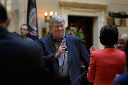 Scott Sommerdorf   |  The Salt Lake Tribune
USU basketball coach Stew Morrill acknowledges the applause of the Senate after he was honored there, Thursday, February 12, 2015.