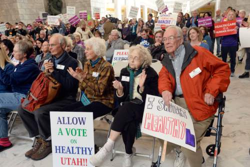 Al Hartmann  |  The Salt Lake Tribune 
The Utah Health Policy Project, hundreds of citizens and advocates of the governor's plan to expand Medicaid, Healthy Utah rally at noon Thursday March 5 inside the capitol rotunda.