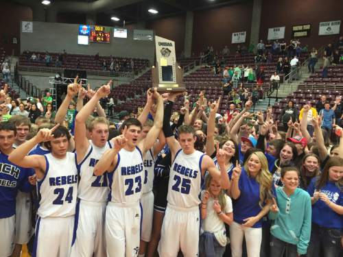 Trevor Phibbs  |  The Salt Lake Tribune

Rich players celebrate winning the 1A boys' championship at the Sevier Valley Center in Richfield. Saturday, March 7, 2015.