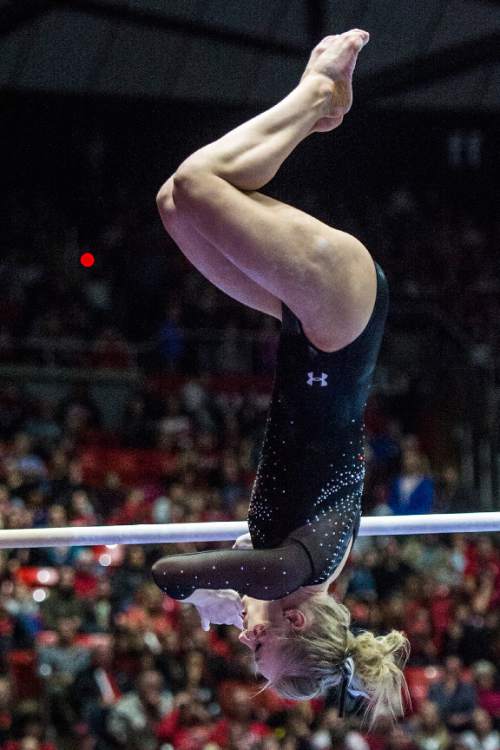 Chris Detrick  |  The Salt Lake Tribune
Utah's Georgia Dabritz competes on the bars during the gymnastics meet against Michigan at the Jon M. Huntsman Center Friday March 6, 2015. Utah defeated Michigan 198.250 to 197.675. Dabritz scored a perfect 10 on the bars.