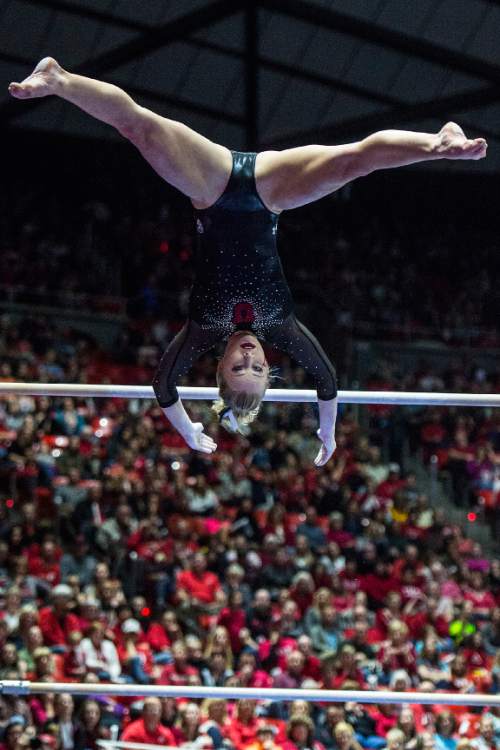 Chris Detrick  |  The Salt Lake Tribune
Utah's Georgia Dabritz competes on the bars during the gymnastics meet against Michigan at the Jon M. Huntsman Center Friday March 6, 2015. Utah defeated Michigan 198.250 to 197.675. Dabritz scored a perfect 10 on the bars.