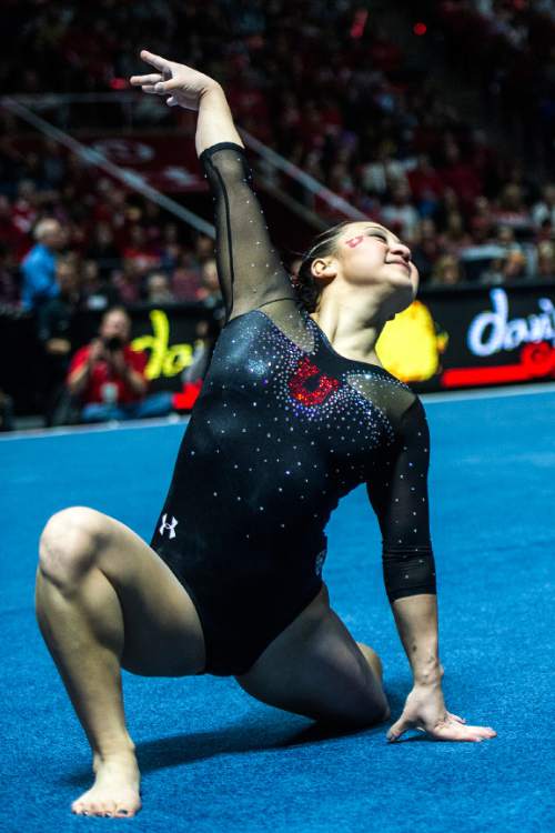 Chris Detrick  |  The Salt Lake Tribune
Utah's Corrie Lothrop competes on the floor during the gymnastics meet against Michigan at the Jon M. Huntsman Center Friday March 6, 2015. Utah defeated Michigan 198.250 to 197.675. Lothrop scored a 9.925.