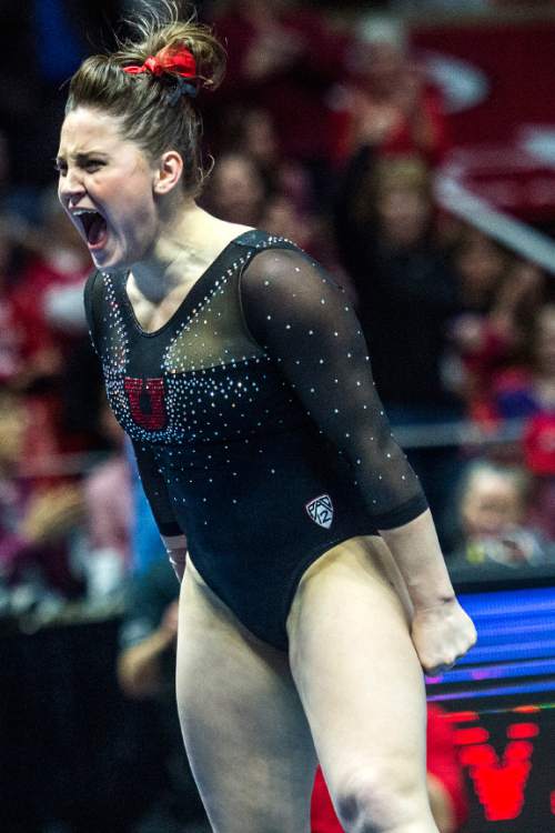 Chris Detrick  |  The Salt Lake Tribune
Utah's Becky Tutka reacts after competing on the floor during the gymnastics meet against Michigan at the Jon M. Huntsman Center Friday March 6, 2015. Utah defeated Michigan 198.250 to 197.675. Tutka scored a 9.925.