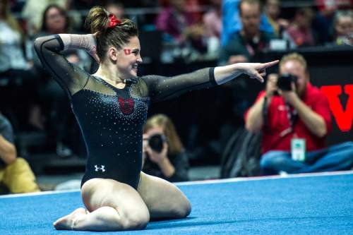 Chris Detrick  |  The Salt Lake Tribune
Utah's Becky Tutka competes on the floor during the gymnastics meet against Michigan at the Jon M. Huntsman Center Friday March 6, 2015. Utah defeated Michigan 198.250 to 197.675. Tutka scored a 9.925.