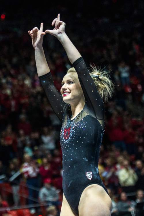Chris Detrick  |  The Salt Lake Tribune
Utah's Georgia Dabritz celebrates after competing on the floor during the gymnastics meet against Michigan at the Jon M. Huntsman Center Friday March 6, 2015. Utah defeated Michigan 198.250 to 197.675. Dabritz scored a 9.950.