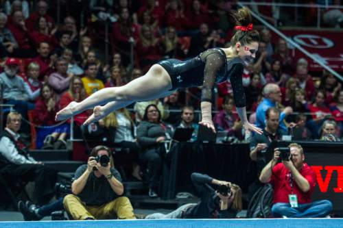 Chris Detrick  |  The Salt Lake Tribune
Utah's Becky Tutka competes on the floor during the gymnastics meet against Michigan at the Jon M. Huntsman Center Friday March 6, 2015. Utah defeated Michigan 198.250 to 197.675. Tutka scored a 9.925.