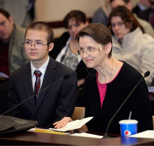 Al Hartmann  |  The Salt Lake Tribune 
Neka Allgood, right, with her transgender son Grayson speaks for passing the Antidiscrimination and Religious Freedom, SB296 sponsored by Sen. Stephen Urquhart, R, Saint George, and Sen. Stuart Adams, R-Layton, as it gets its first hearing Thursday March 5 in the Senate Business and Labor Committee.