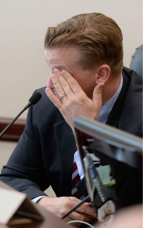Al Hartmann  |  The Salt Lake Tribune 
Senator Todd Weiler, R-Woods Cross has an emotional moment holding back a tear as he explains why he is voting yes for the landmark Antidiscrimination and Religious Freedom, SB296 sponsored by Sen. Stephen Urquhart, R-Saint George, left, and Sen. Stuart Adams, R-Layton, Thursday March 5 in the Senate Business and Labor Committee.