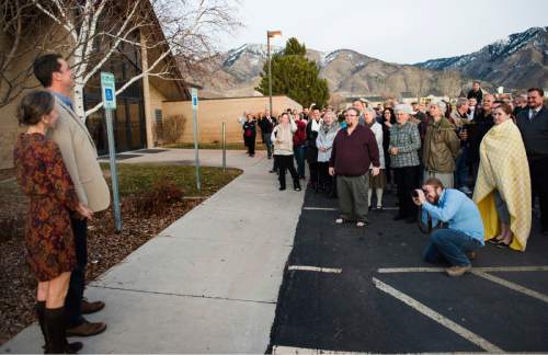 Rick Egan  |  The Salt Lake Tribune

John Dehlin and his wife Margi speak to a crowd of more than 200 people as they arrive at the North Logan LDS Stake Center for the disciplinary council in North Logan, Sunday, February 8, 2015