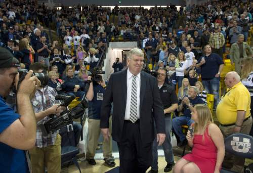 Rick Egan  |  The Salt Lake Tribune

Utah State Aggies head coach Stew Morrill arrives on the floor for his last home game as head coach, before the USU Colorado State basketball game in Logan, Saturday, March 7, 2015