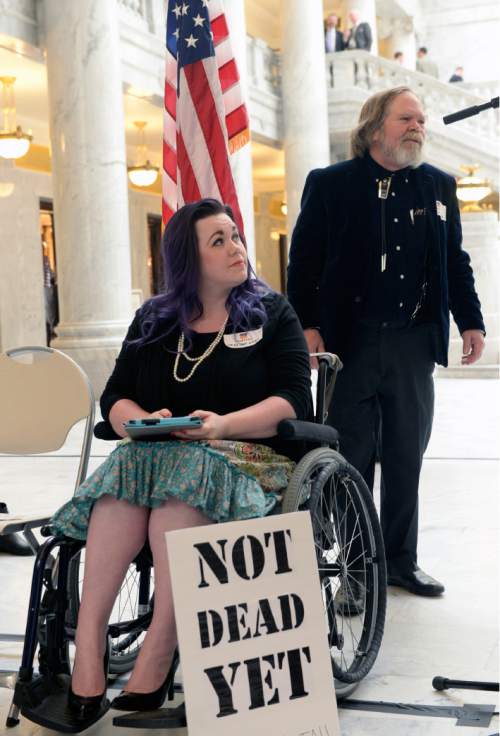 Al Hartmann  |  The Salt Lake Tribune 
Stacy Stanford, a Westminster College student, gets set to speak at the Capitol Rotunda on Thursday, March 5, 2015. She and hundreds of citizens and advocates of the governor's plan to expand Medicaid, Healthy Utah, rallied.  She uses a wheelchair after an auto accident resulted in a neurolgical disorder. She is uninsured.