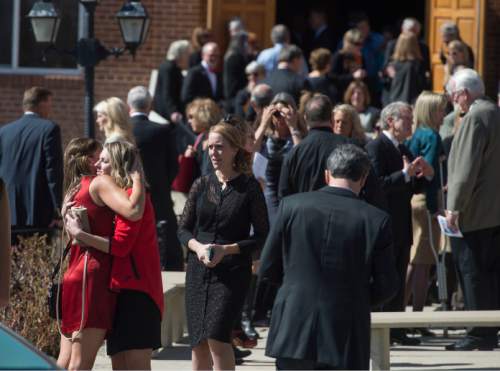 Steve Griffin  |  The Salt Lake Tribune

People hug outside Wasatch Presbyterian Church after a celebration of life service for former Mayor Deedee Corradini in Salt Lake City, Monday, March 9, 2015.