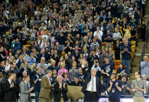 Rick Egan  |  The Salt Lake Tribune

Stew Morrill acknowledges the crowd as he enters the court for his last home game as head coach, before the USU Colorado State basketball game in Logan, Saturday, March 7, 2015