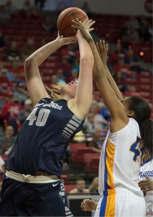 Rick Egan  |  The Salt Lake Tribune

Utah State center Hannah Hutchins (40) shoots for the Aggies, as San Jose State Spartans center Riana Byrd (44) defends, in the Mountain West Conference Basketball Championships, at the Thomas & Mac Center, in Las Vegas,  Monday, March 9, 2015