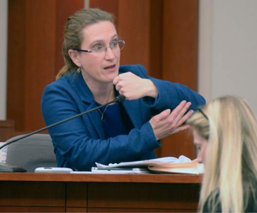 AAl Hartmann  |  The Salt Lake Tribune 
Dr. Judy Melinek testifies in 3rd District Court Monday March 9, 2015, in Salt Lake City in Johnny Brickman Wall's murder trial. She is a board certified forensic pathologist from California testifying for the defense. Wall, a former Utah pediatrician, is accused of killing his ex-wife, Uta von Schwedler, at her Sugar House home in 2011.
