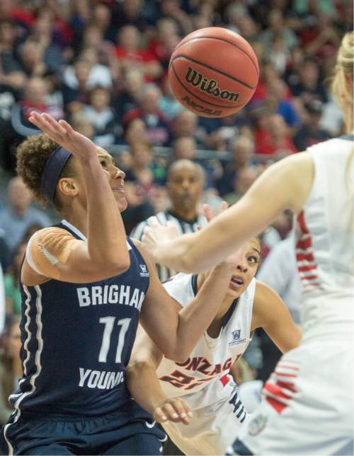 Rick Egan  |  The Salt Lake Tribune

Brigham Young Cougars guard Xojian Harry (11) gets tangled up with Gonzaga Bulldogs forward Shaniqua Nilles (22),in the West Coast Conference Basketball Championships, at the Orleans Arena, in Las Vegas,  Monday, March 9, 2015
