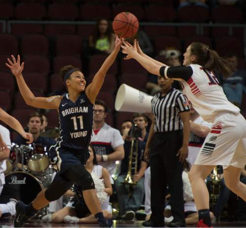 Rick Egan  |  The Salt Lake Tribune

Brigham Young Cougars guard Xojian Harry (11) goes for the ball, along with Gonzaga Bulldogs center Emma Wolfram (12), in the West Coast Conference Basketball Championships, at the Orleans Arena, in Las Vegas,  Monday, March 9, 2015