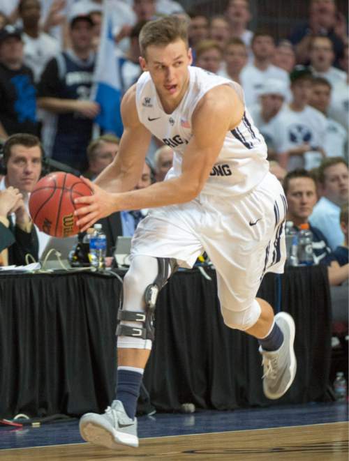 Rick Egan  |  The Salt Lake Tribune

Brigham Young Cougars guard Kyle Collinsworth (5) leads a fast break after stealing the ball in West Coast Conference Basketball Championship action, BYU vs. Portland, at the Orleans Arena in Las Vegas, Monday, March 9, 2015.