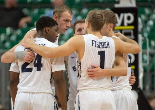 Rick Egan  |  The Salt Lake Tribune

The Brigham Young Cougars group together during a time out in West Coast Conference Basketball Championship action, BYU vs. Portland, at the Orleans Arena in Las Vegas, Monday, March 9, 2015.